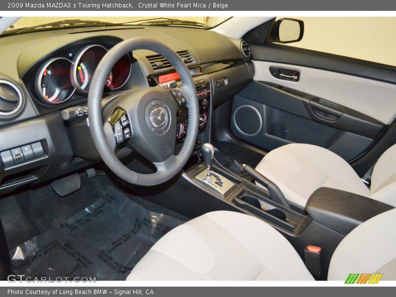 Crystal White Pearl Mica / Beige 2009 Mazda MAZDA3 s Touring Hatchback