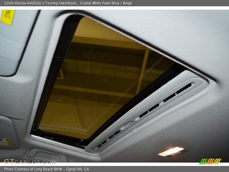 Crystal White Pearl Mica / Beige 2009 Mazda MAZDA3 s Touring Hatchback