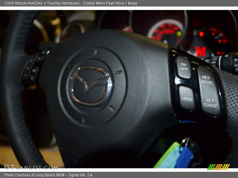 Crystal White Pearl Mica / Beige 2009 Mazda MAZDA3 s Touring Hatchback