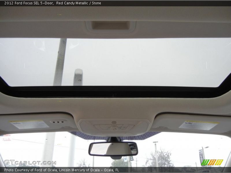 Red Candy Metallic / Stone 2012 Ford Focus SEL 5-Door