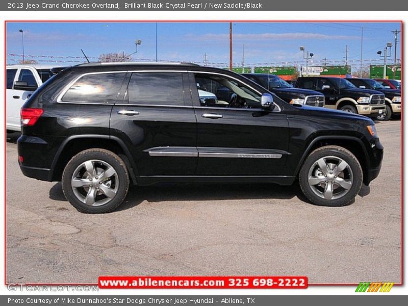 Brilliant Black Crystal Pearl / New Saddle/Black 2013 Jeep Grand Cherokee Overland