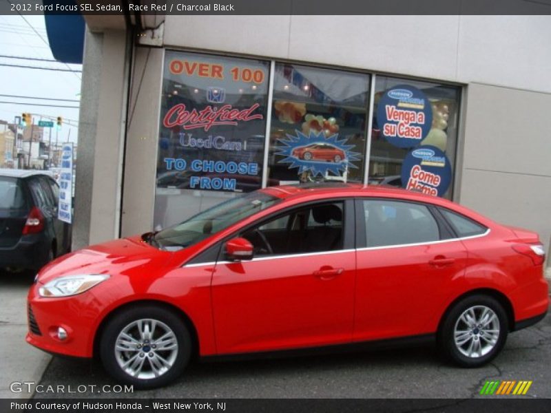 Race Red / Charcoal Black 2012 Ford Focus SEL Sedan