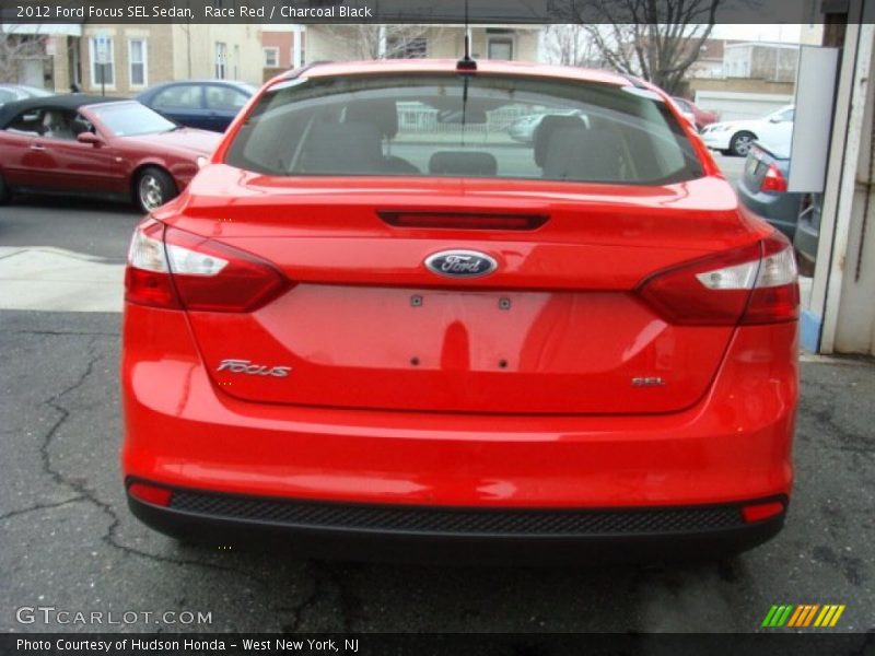 Race Red / Charcoal Black 2012 Ford Focus SEL Sedan
