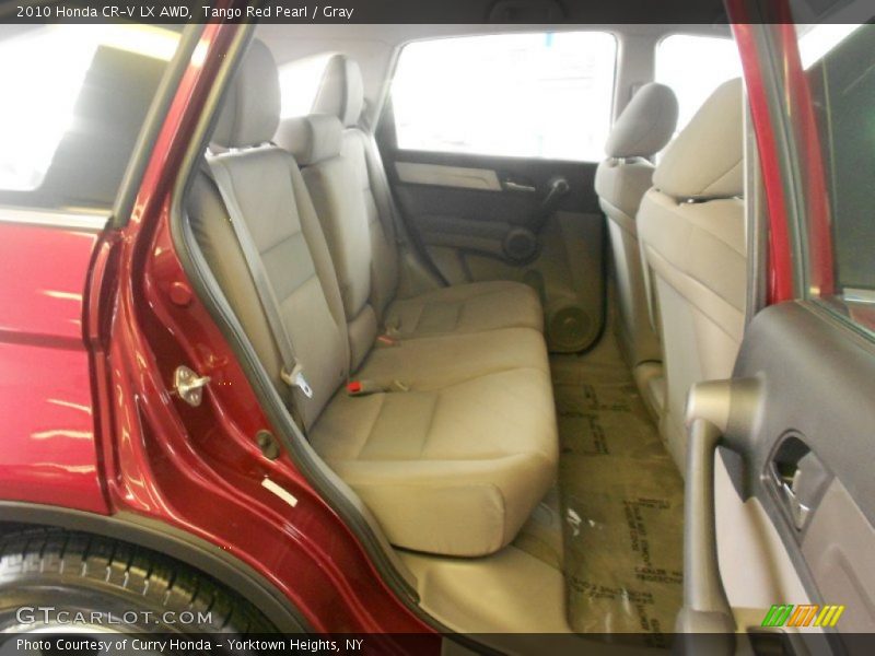 Tango Red Pearl / Gray 2010 Honda CR-V LX AWD
