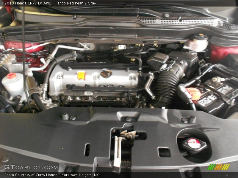 Tango Red Pearl / Gray 2010 Honda CR-V LX AWD