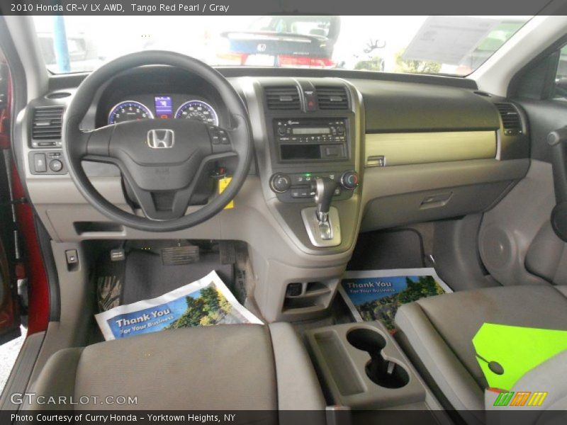 Tango Red Pearl / Gray 2010 Honda CR-V LX AWD
