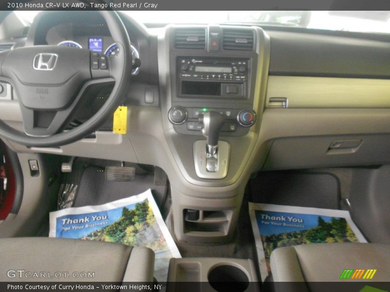 Tango Red Pearl / Gray 2010 Honda CR-V LX AWD