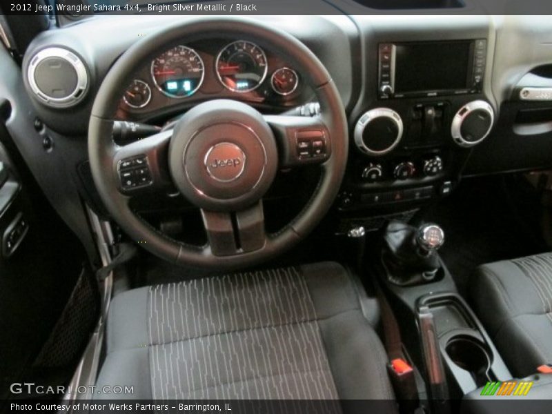 Bright Silver Metallic / Black 2012 Jeep Wrangler Sahara 4x4