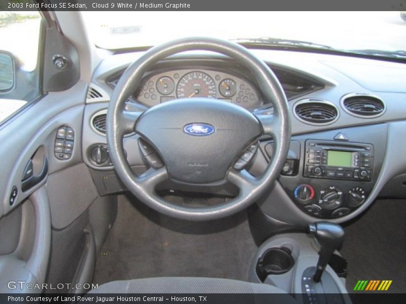 Cloud 9 White / Medium Graphite 2003 Ford Focus SE Sedan
