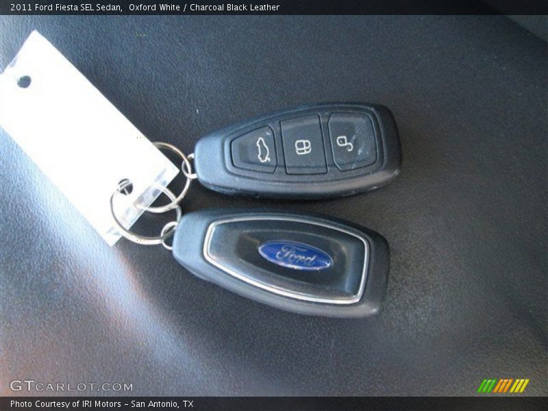 Oxford White / Charcoal Black Leather 2011 Ford Fiesta SEL Sedan