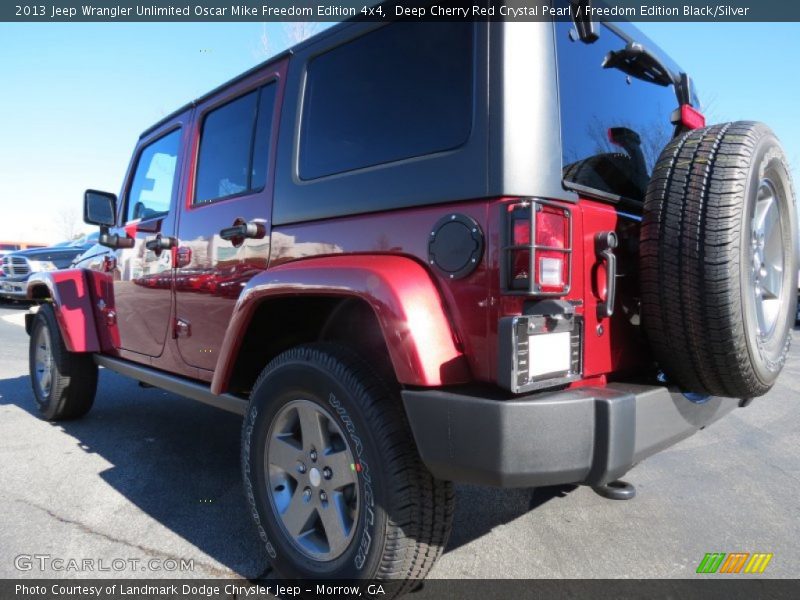 Deep Cherry Red Crystal Pearl / Freedom Edition Black/Silver 2013 Jeep Wrangler Unlimited Oscar Mike Freedom Edition 4x4