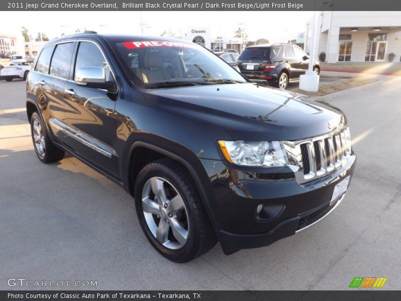 Brilliant Black Crystal Pearl / Dark Frost Beige/Light Frost Beige 2011 Jeep Grand Cherokee Overland