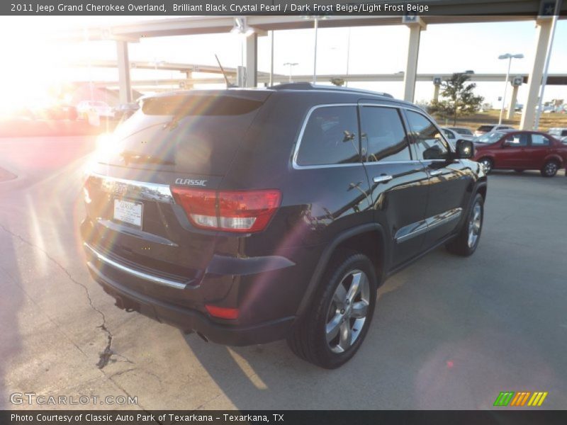 Brilliant Black Crystal Pearl / Dark Frost Beige/Light Frost Beige 2011 Jeep Grand Cherokee Overland