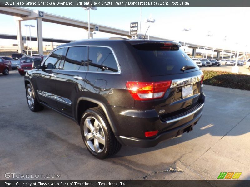 Brilliant Black Crystal Pearl / Dark Frost Beige/Light Frost Beige 2011 Jeep Grand Cherokee Overland