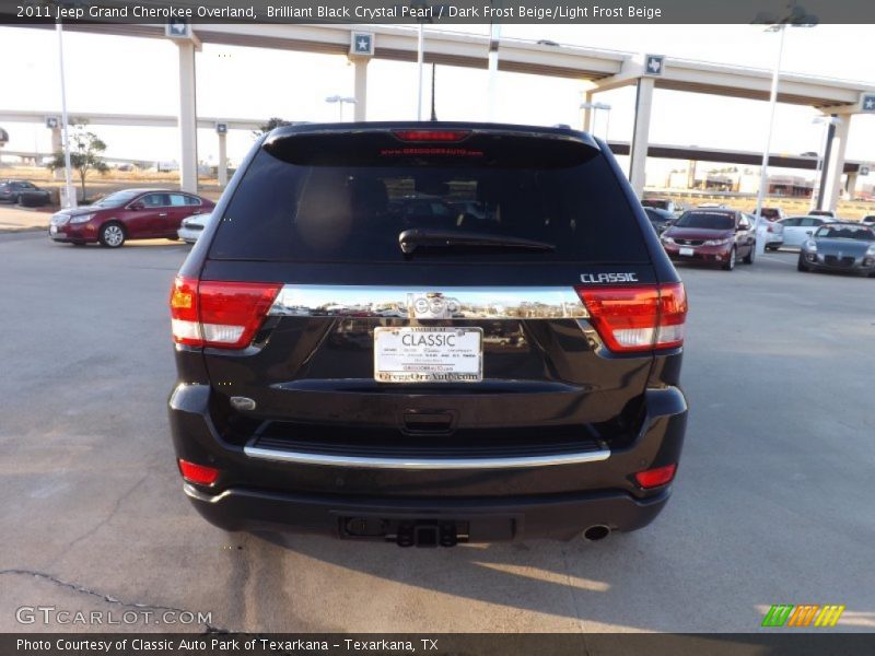 Brilliant Black Crystal Pearl / Dark Frost Beige/Light Frost Beige 2011 Jeep Grand Cherokee Overland