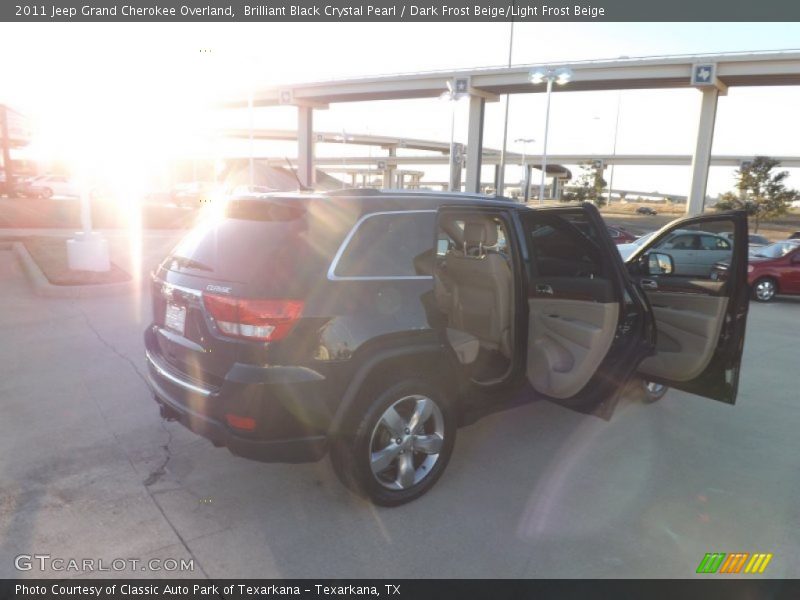 Brilliant Black Crystal Pearl / Dark Frost Beige/Light Frost Beige 2011 Jeep Grand Cherokee Overland