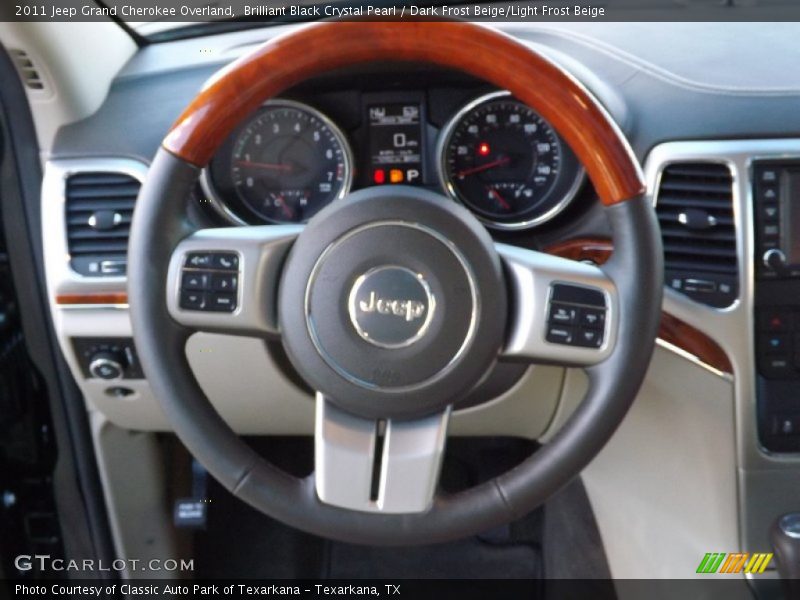 Brilliant Black Crystal Pearl / Dark Frost Beige/Light Frost Beige 2011 Jeep Grand Cherokee Overland