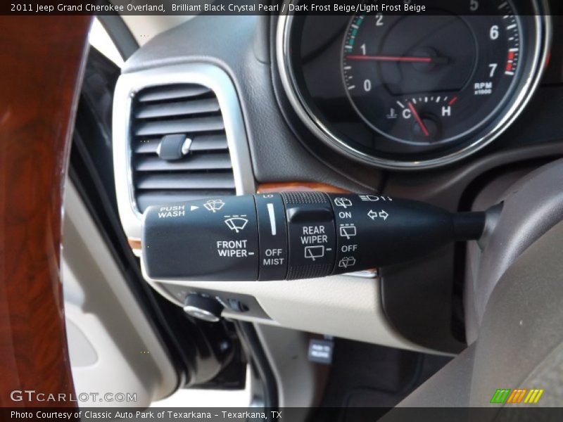 Brilliant Black Crystal Pearl / Dark Frost Beige/Light Frost Beige 2011 Jeep Grand Cherokee Overland