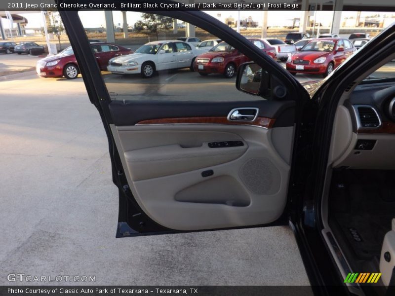 Brilliant Black Crystal Pearl / Dark Frost Beige/Light Frost Beige 2011 Jeep Grand Cherokee Overland