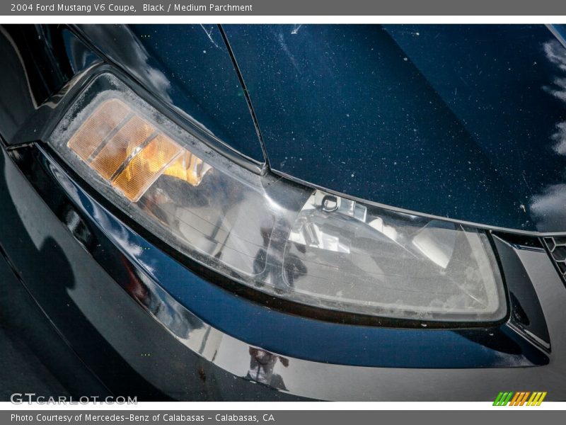 Black / Medium Parchment 2004 Ford Mustang V6 Coupe