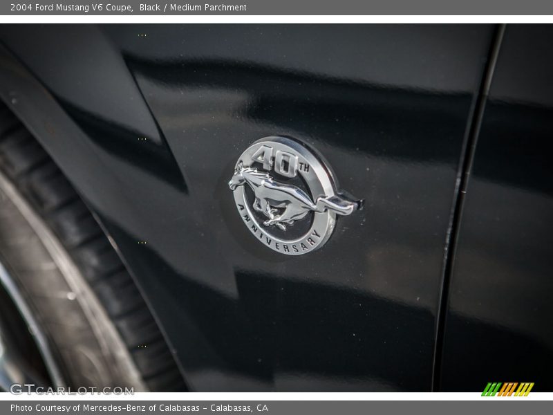 Black / Medium Parchment 2004 Ford Mustang V6 Coupe