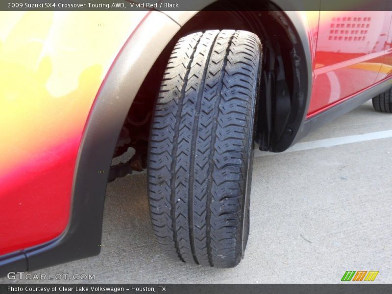 Vivid Red / Black 2009 Suzuki SX4 Crossover Touring AWD