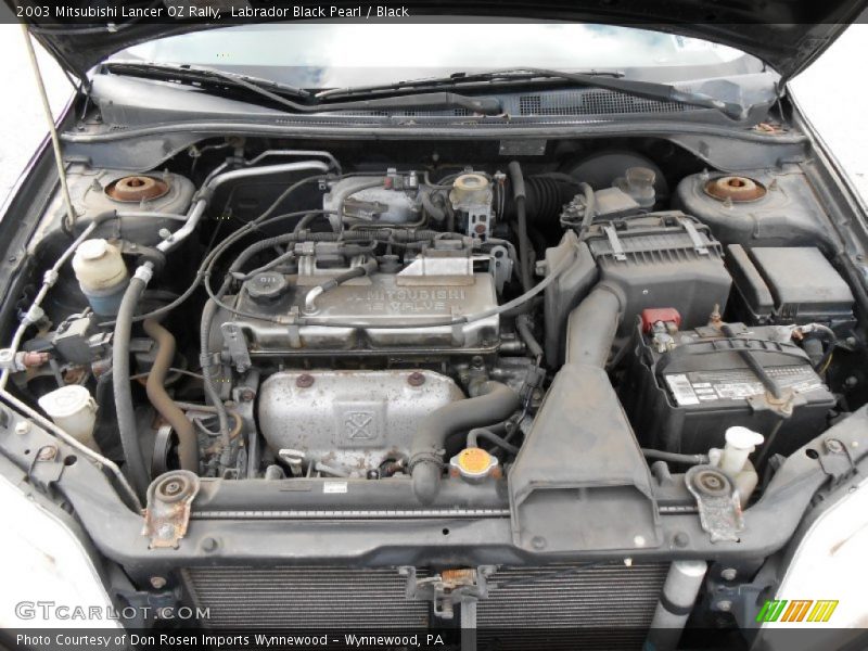 Labrador Black Pearl / Black 2003 Mitsubishi Lancer OZ Rally