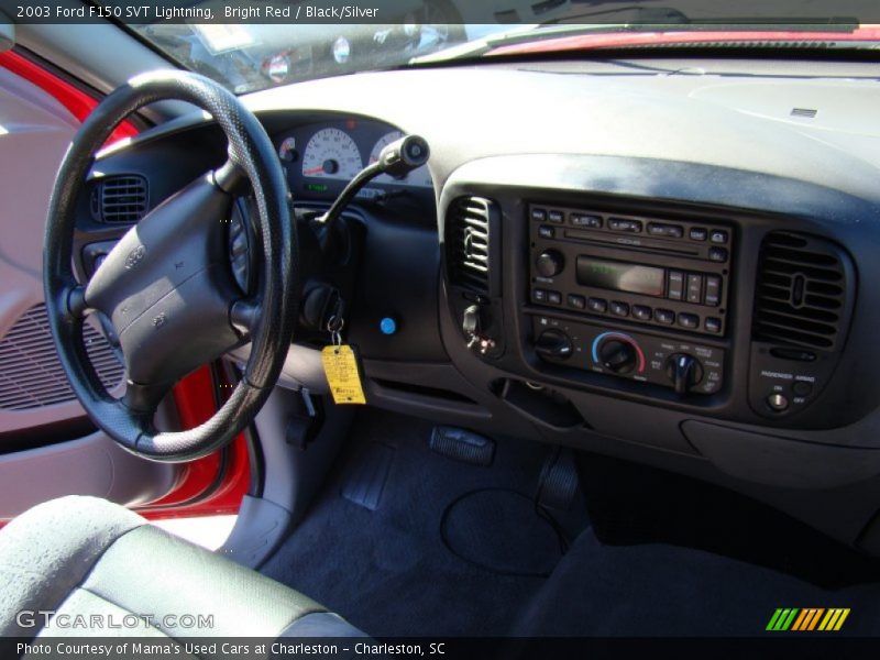 Bright Red / Black/Silver 2003 Ford F150 SVT Lightning