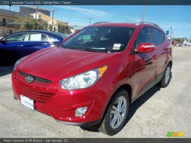 Garnet Red / Taupe 2013 Hyundai Tucson GLS