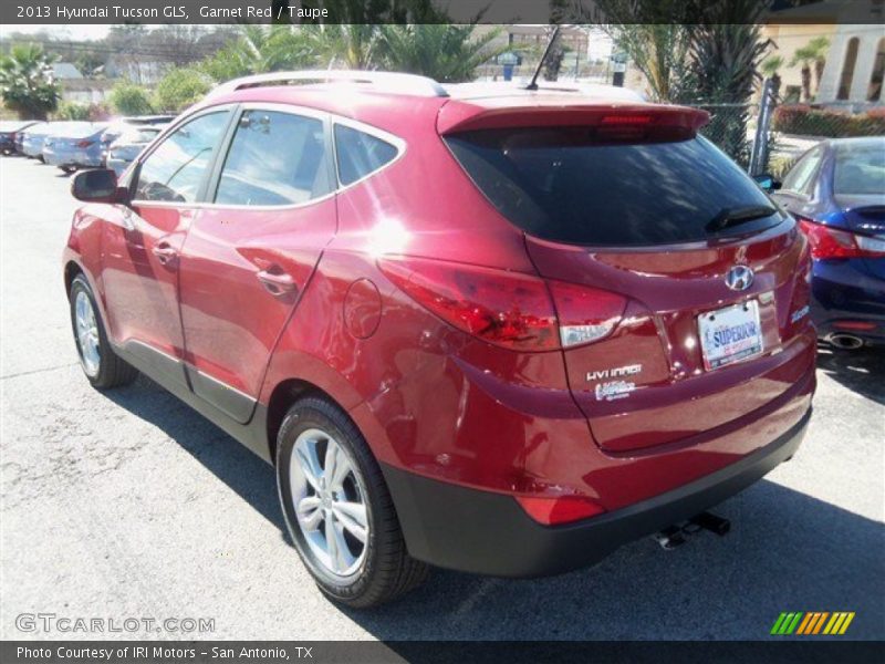 Garnet Red / Taupe 2013 Hyundai Tucson GLS