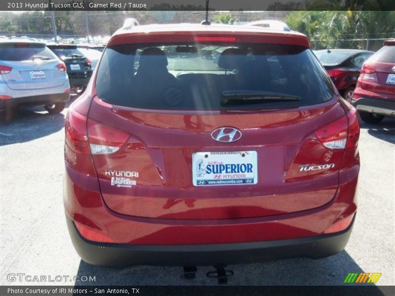 Garnet Red / Taupe 2013 Hyundai Tucson GLS