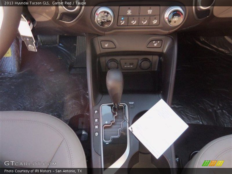 Garnet Red / Taupe 2013 Hyundai Tucson GLS