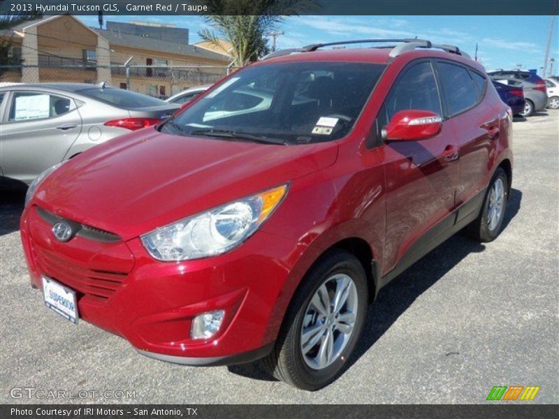 Garnet Red / Taupe 2013 Hyundai Tucson GLS