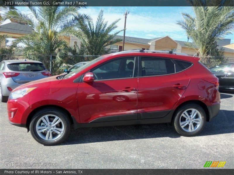 Garnet Red / Taupe 2013 Hyundai Tucson GLS