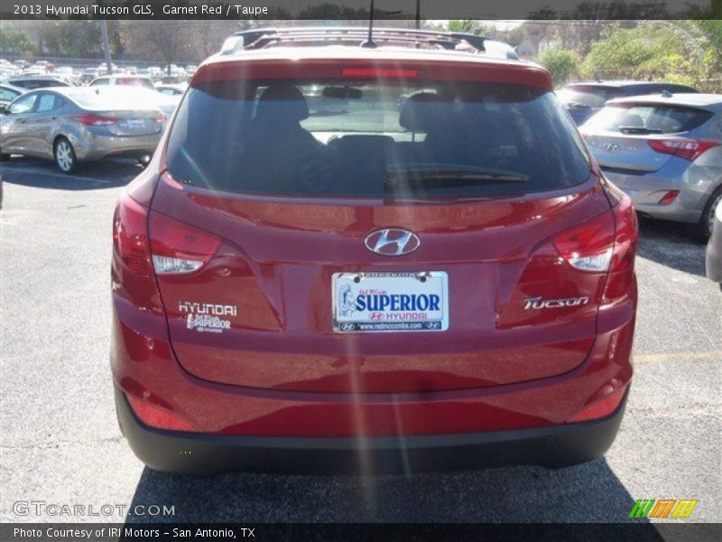 Garnet Red / Taupe 2013 Hyundai Tucson GLS