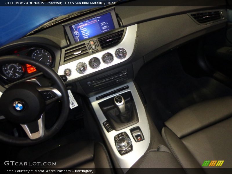 Deep Sea Blue Metallic / Beige 2011 BMW Z4 sDrive35i Roadster