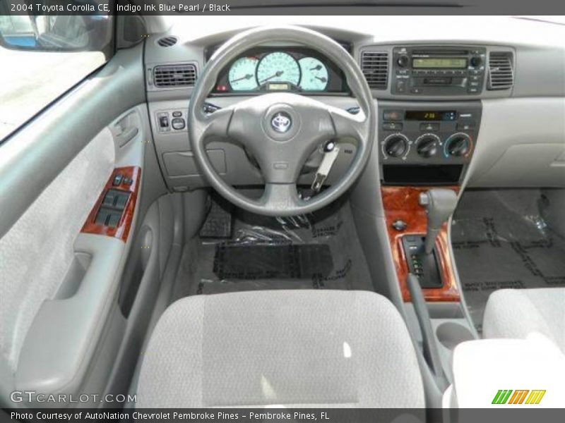 Indigo Ink Blue Pearl / Black 2004 Toyota Corolla CE