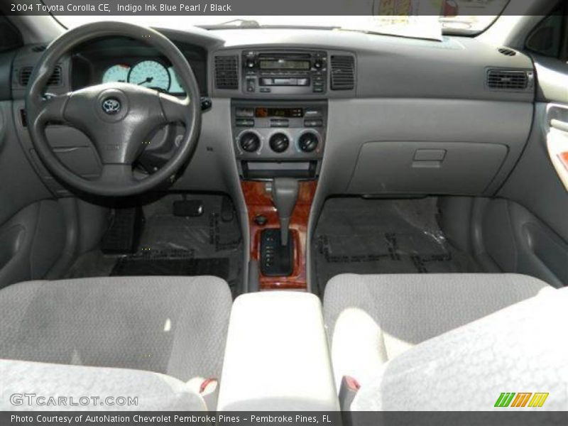 Indigo Ink Blue Pearl / Black 2004 Toyota Corolla CE
