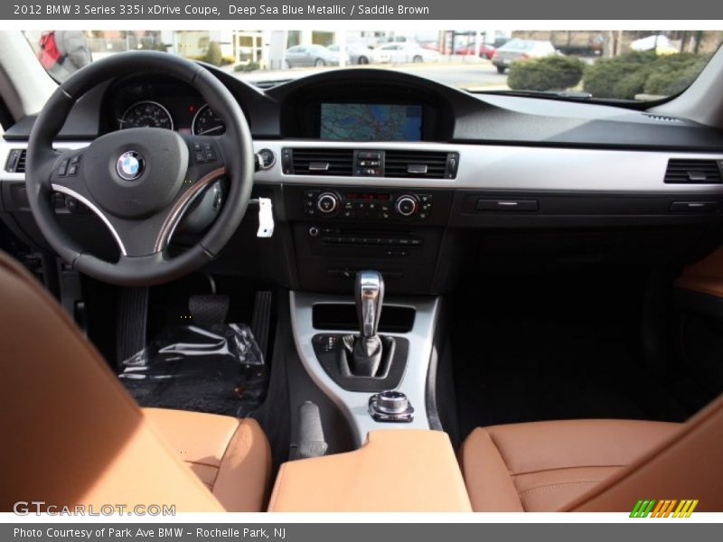 Deep Sea Blue Metallic / Saddle Brown 2012 BMW 3 Series 335i xDrive Coupe