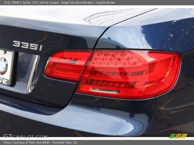 Deep Sea Blue Metallic / Saddle Brown 2012 BMW 3 Series 335i xDrive Coupe