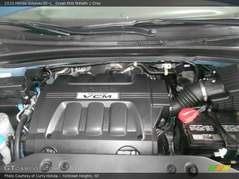 Ocean Mist Metallic / Gray 2010 Honda Odyssey EX-L