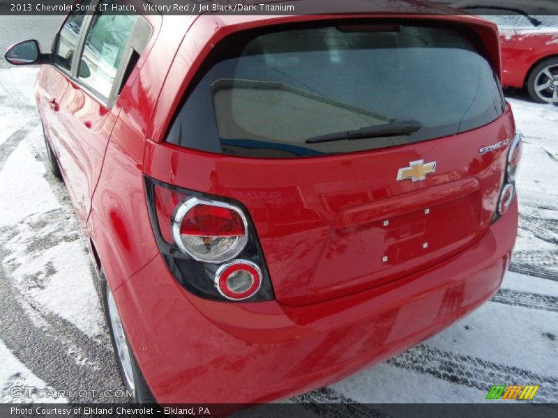 Victory Red / Jet Black/Dark Titanium 2013 Chevrolet Sonic LT Hatch