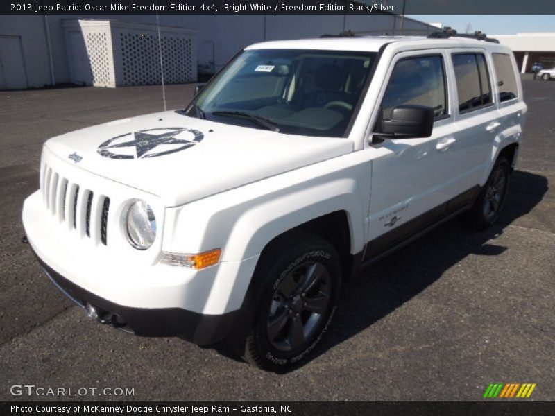 Front 3/4 View of 2013 Patriot Oscar Mike Freedom Edition 4x4