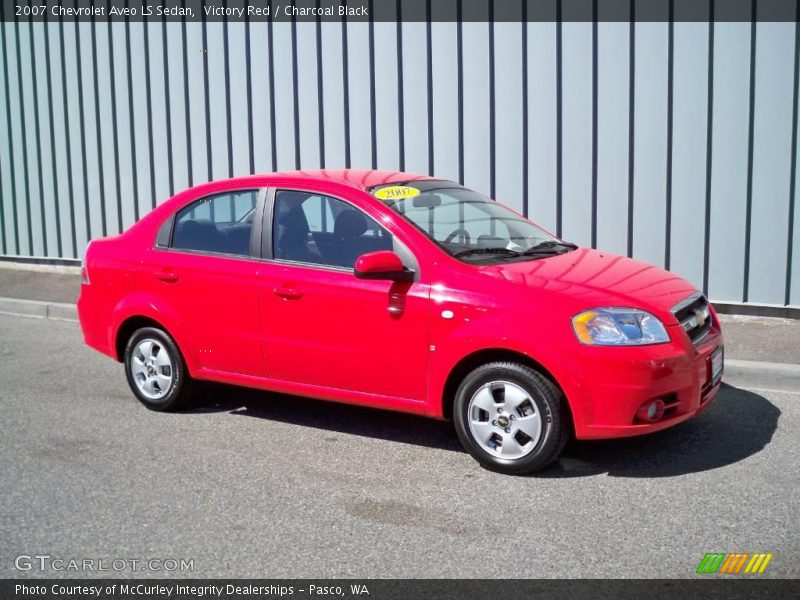 Victory Red / Charcoal Black 2007 Chevrolet Aveo LS Sedan