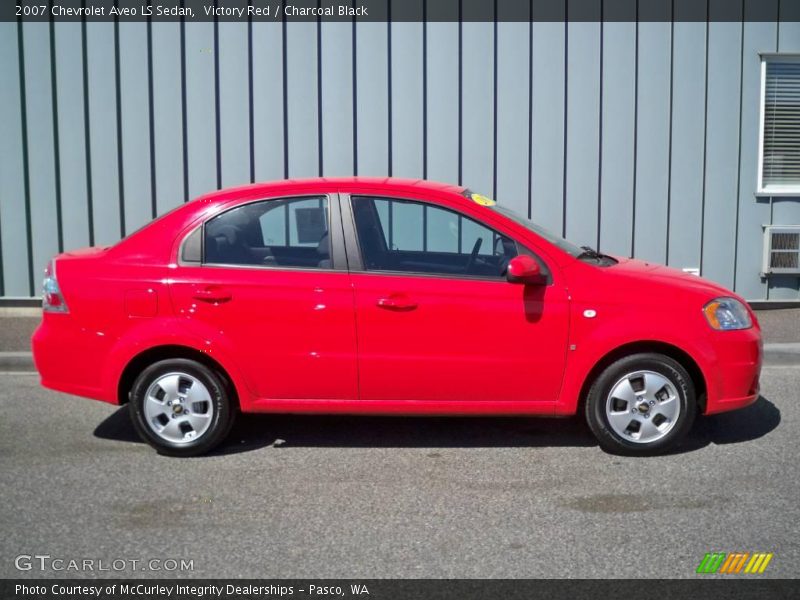 Victory Red / Charcoal Black 2007 Chevrolet Aveo LS Sedan