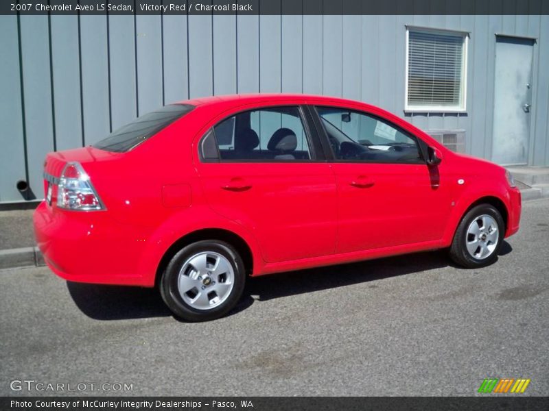 Victory Red / Charcoal Black 2007 Chevrolet Aveo LS Sedan