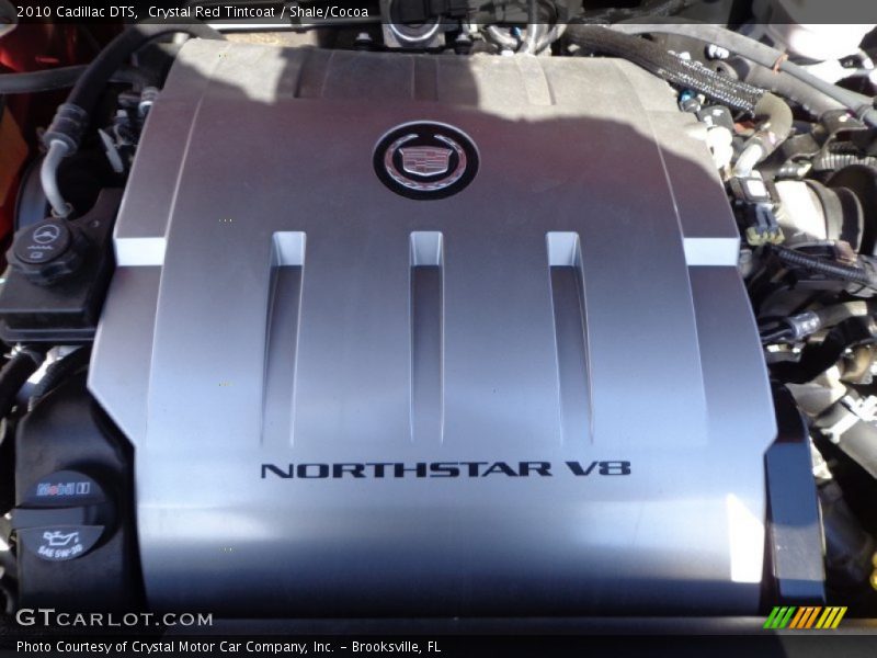 Crystal Red Tintcoat / Shale/Cocoa 2010 Cadillac DTS