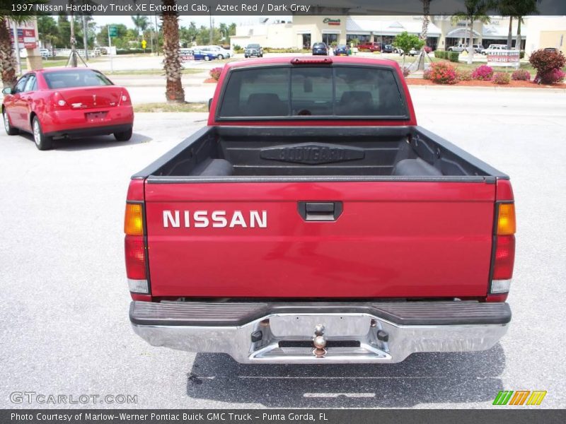 Aztec Red / Dark Gray 1997 Nissan Hardbody Truck XE Extended Cab