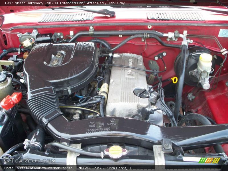 Aztec Red / Dark Gray 1997 Nissan Hardbody Truck XE Extended Cab