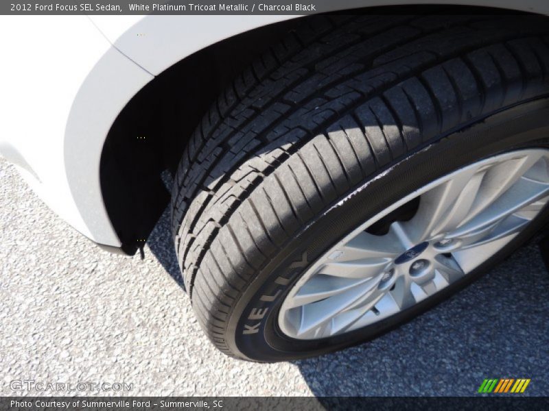 White Platinum Tricoat Metallic / Charcoal Black 2012 Ford Focus SEL Sedan